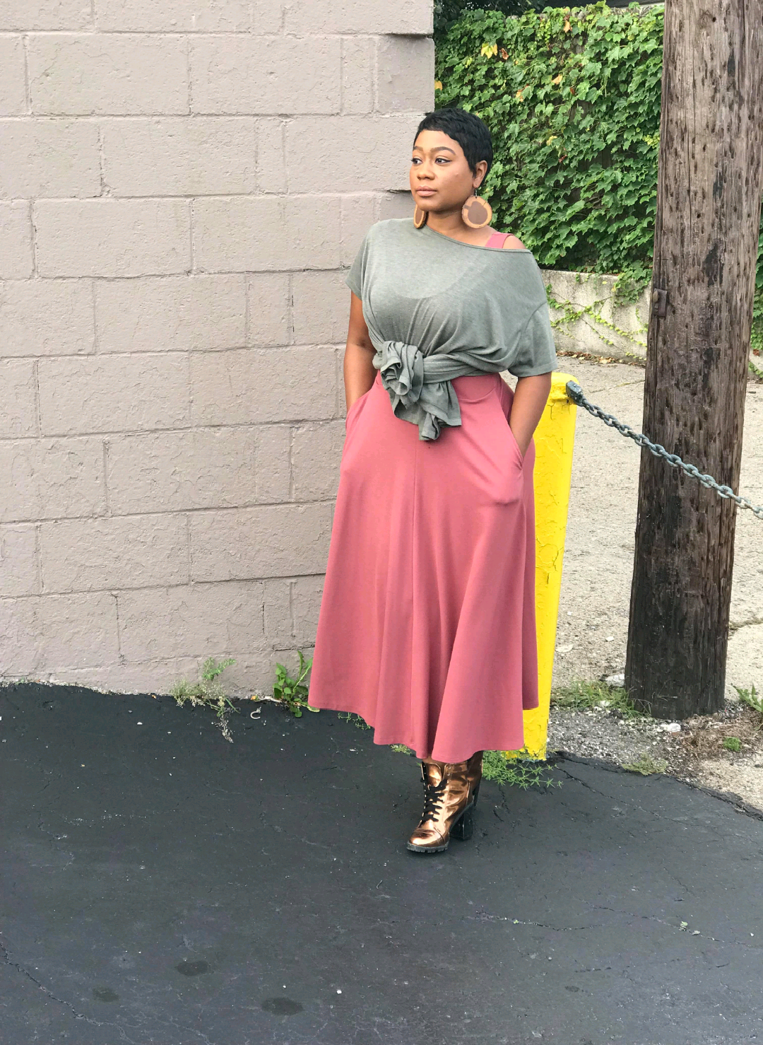 Photo by Larrissa Spears, Boots: Charlotte Russe, Dress: Nordstrom, Shirt: Flo Boutique, Earrings: Four Chamber Forge 