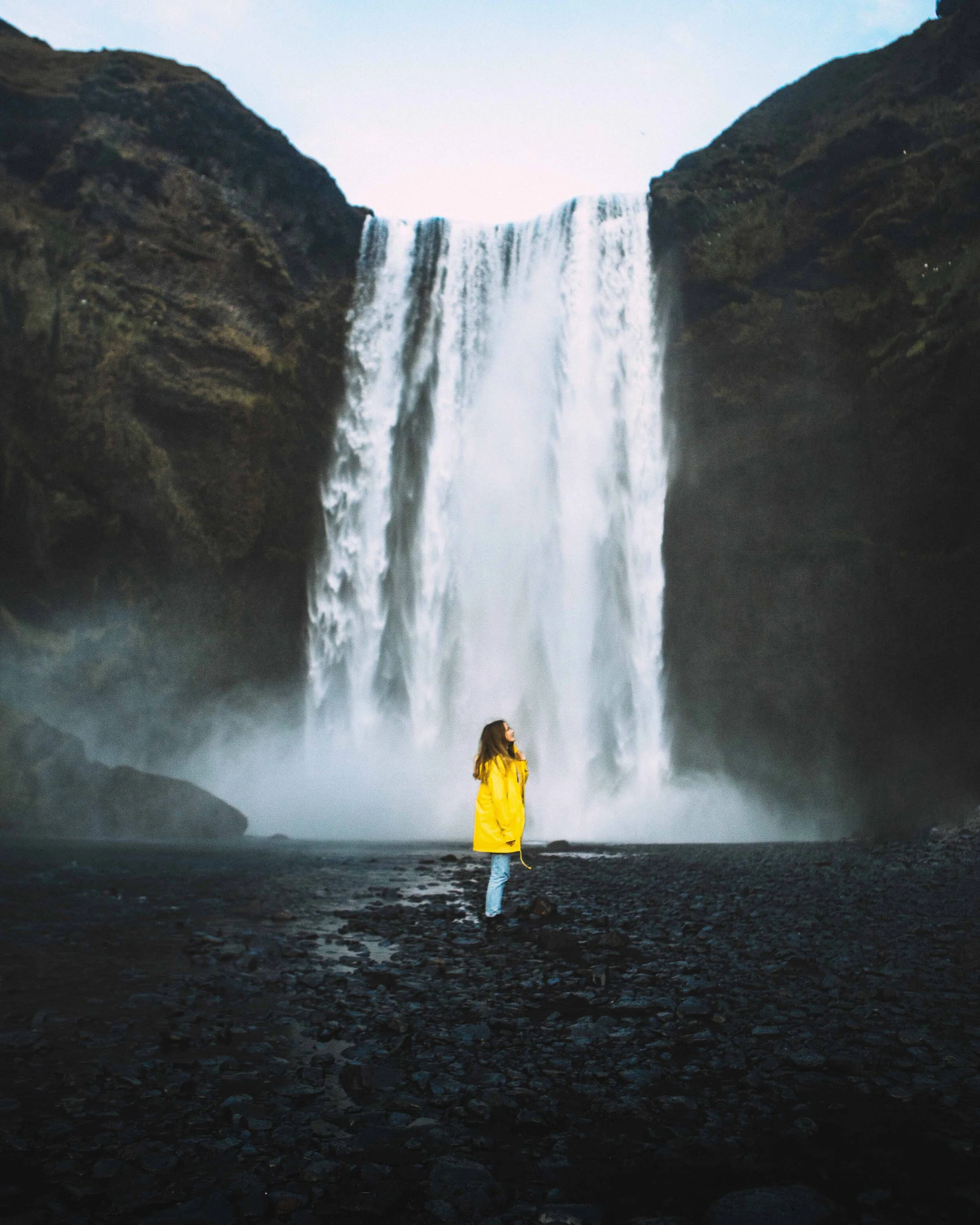 Skogafoss with yellow jacket, Iceland