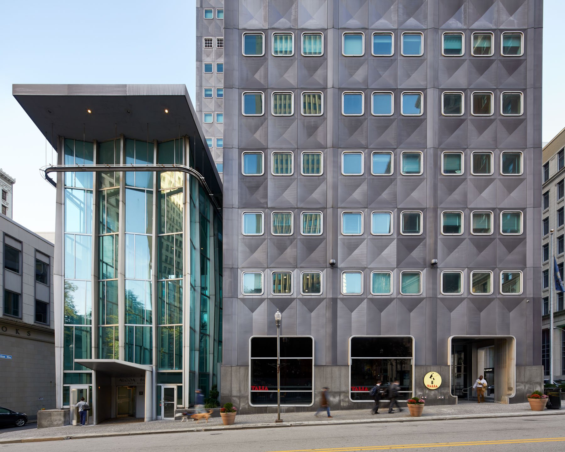   “It’s curtain wall was not constructed piece by piece but prefabricated in aluminum sheets that contained both windows and the floor zone. The windows swing open in special rubber gaskets, so the building's exterior requires minimal cleaning and ma