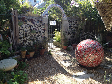 redOrb_in_garden.jpg