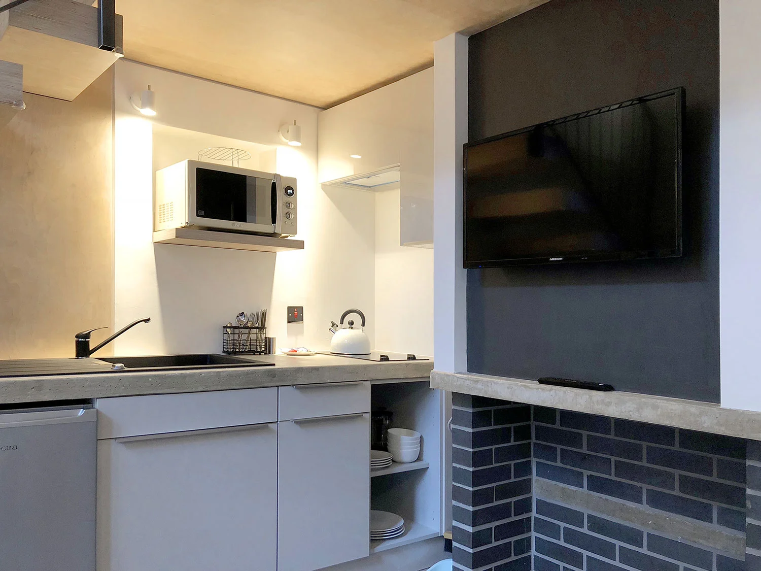Open Kitchen Lounge area in our eco studio retreat accommodation in Portland Dorset