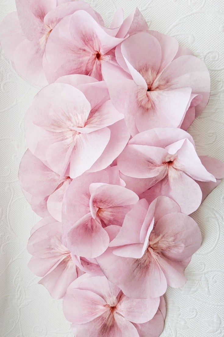 Above: The flowers were created with 3 coffee filters -each cut with 3 petals. They were dip-dyed in diluted craft acrylic paint.
