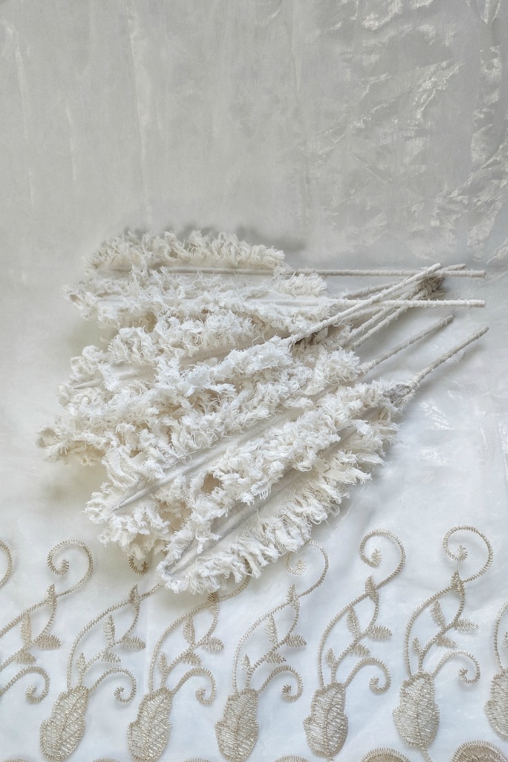 Above: It takes approximately 10 minutes . plus washing and drying time to create un-dyed fluffy fabric feathers.