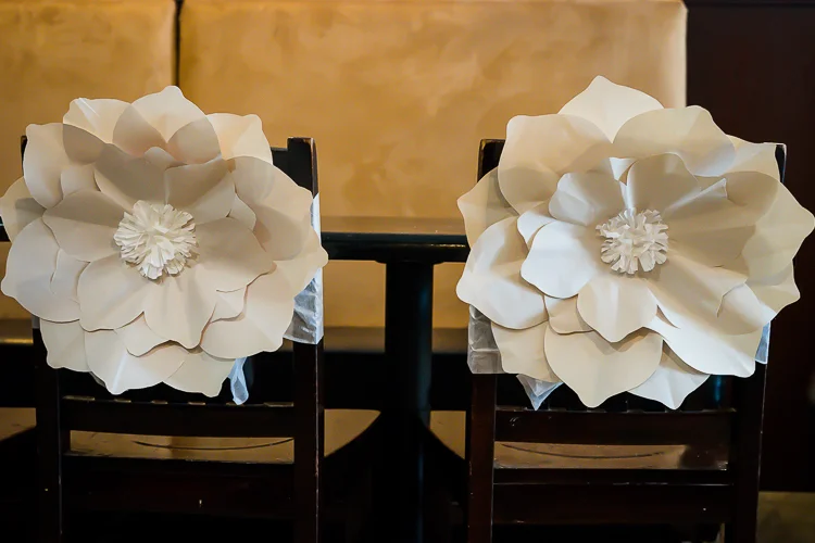 Above: Newsprint circles; folded, cut and shaped in different sizes and stacked creates another variety of flowers.