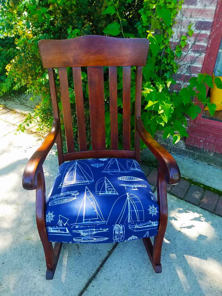 In the end, the rocker maintained its classic style. It was repaired for functionality and updated with a clean fabric.