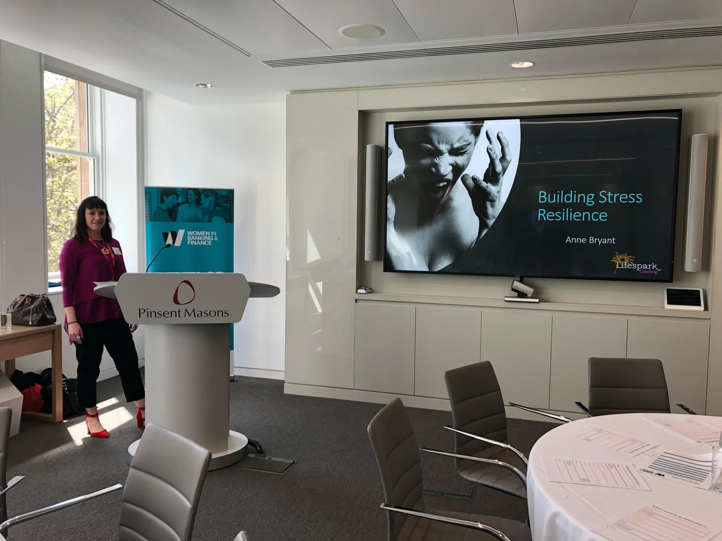Building Stress Resilience session showing the presentation and speaker