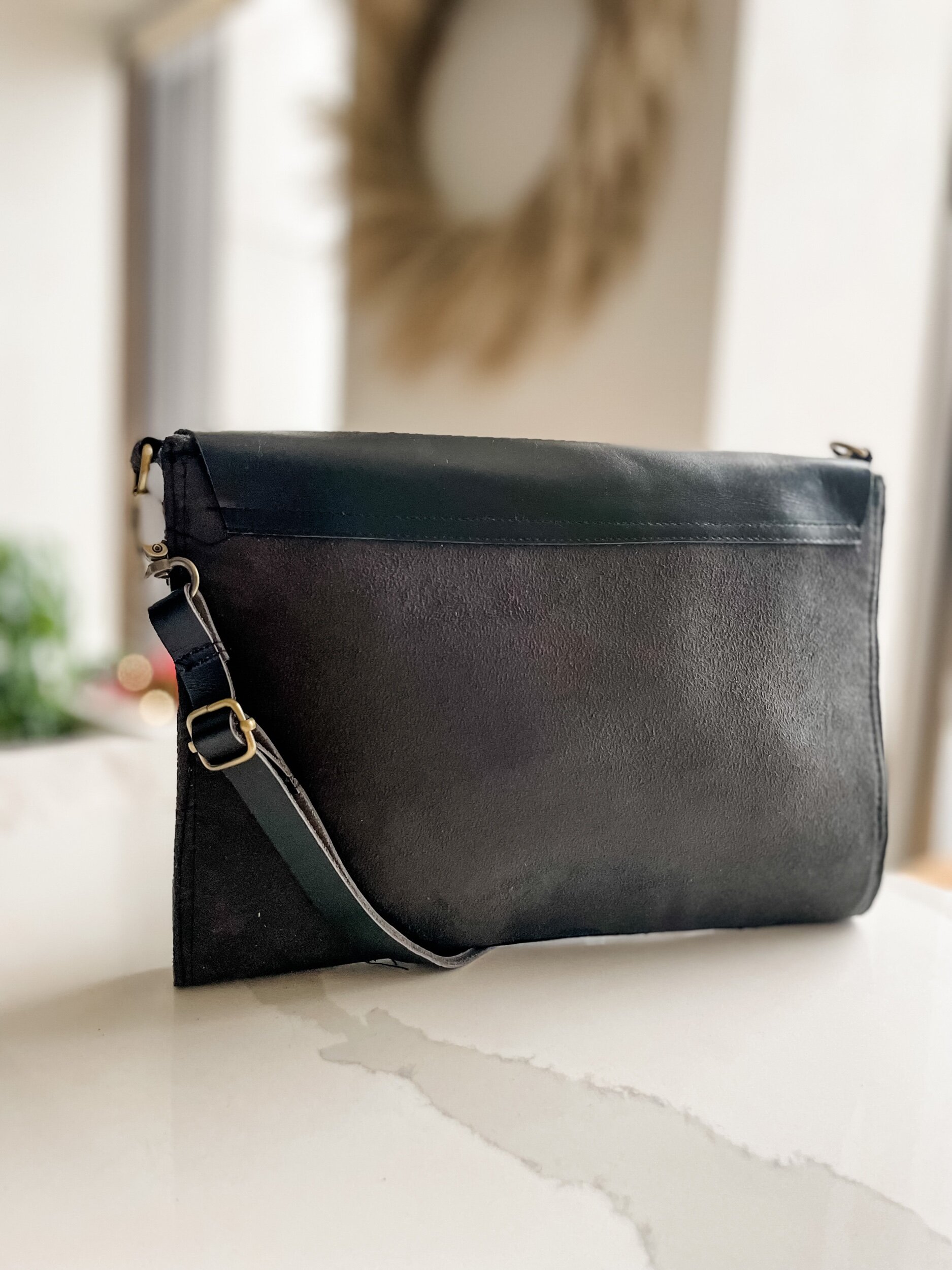 Batik and black leather clutch crossbody with adjustable strap