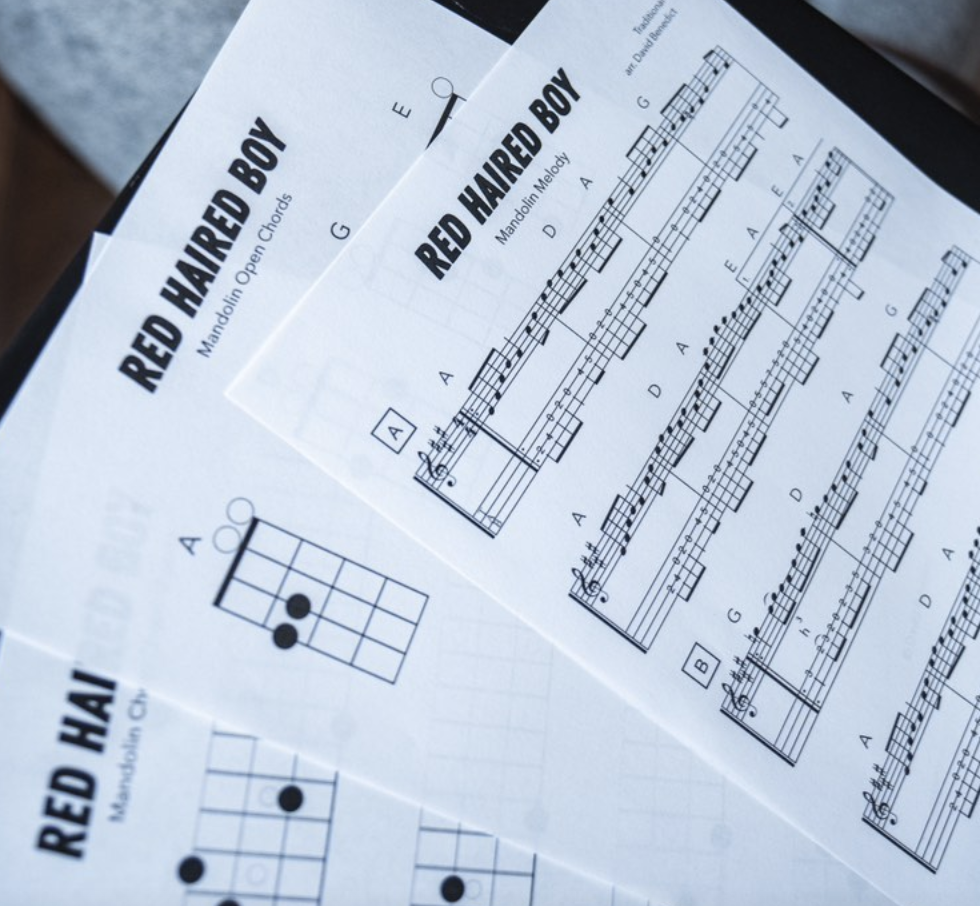 Music sheets for the song 'Red Haired Boy' featuring guitar chords and notation.