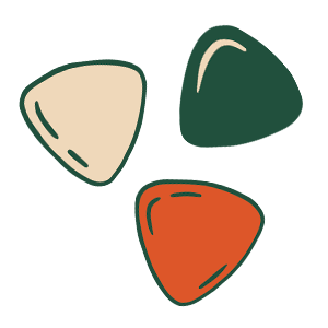 Three colorful mandolin picks in beige, green, and orange.