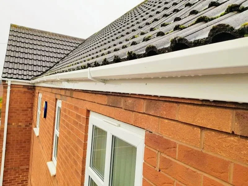 White gutters, fascia and soffits after exterior cleaning on a Dublin home.