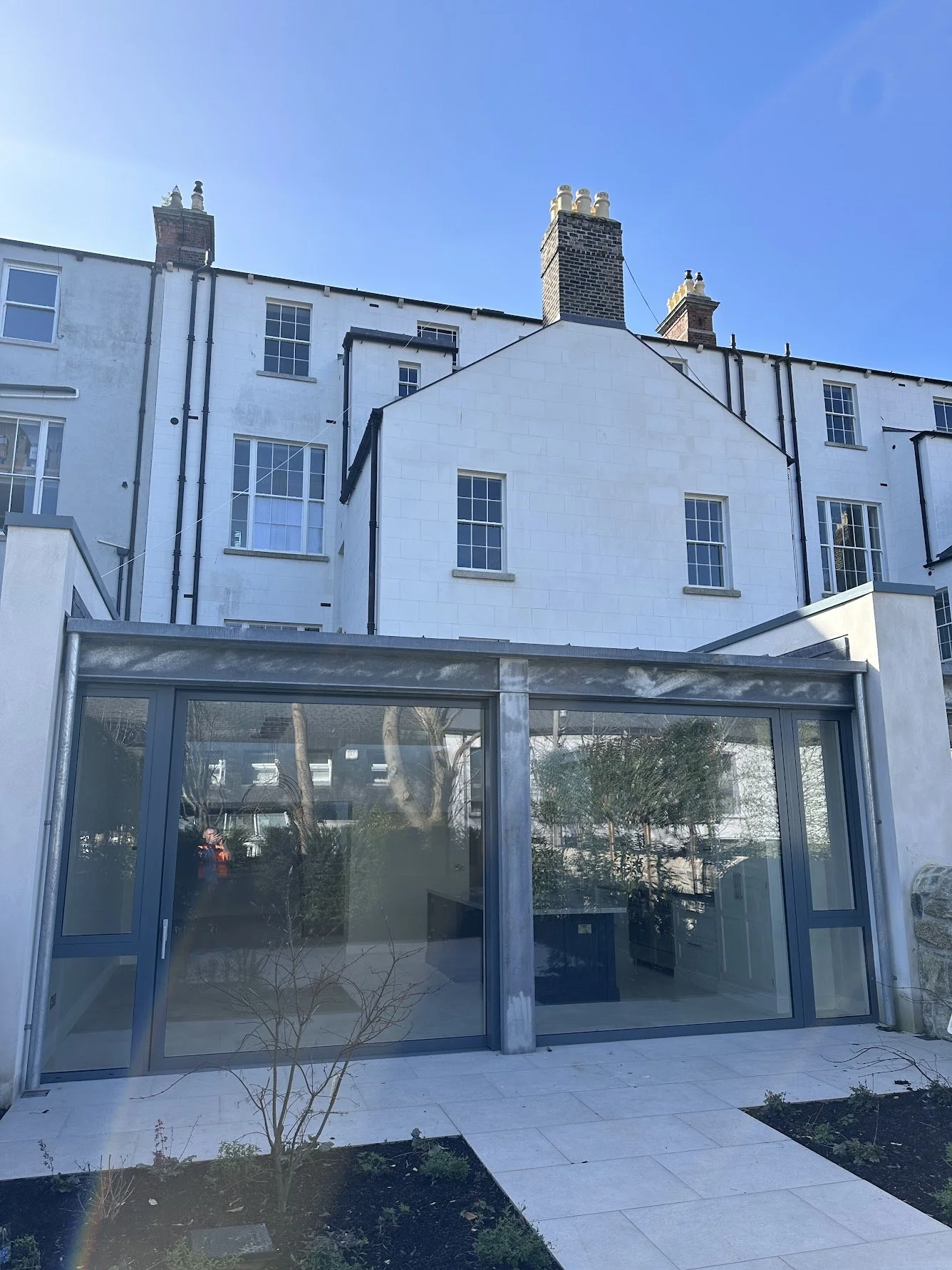 Large glazed extension at a Dublin residential property requiring professional window cleaning.