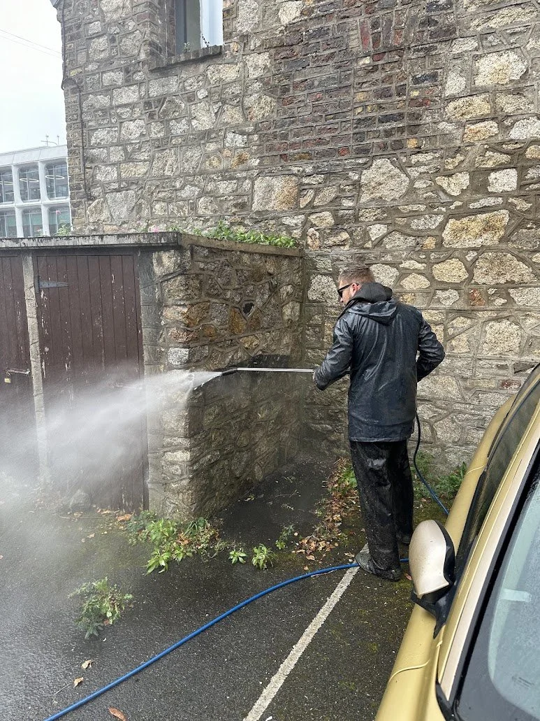 Base team member carrying out professional power washing at a Dublin property.