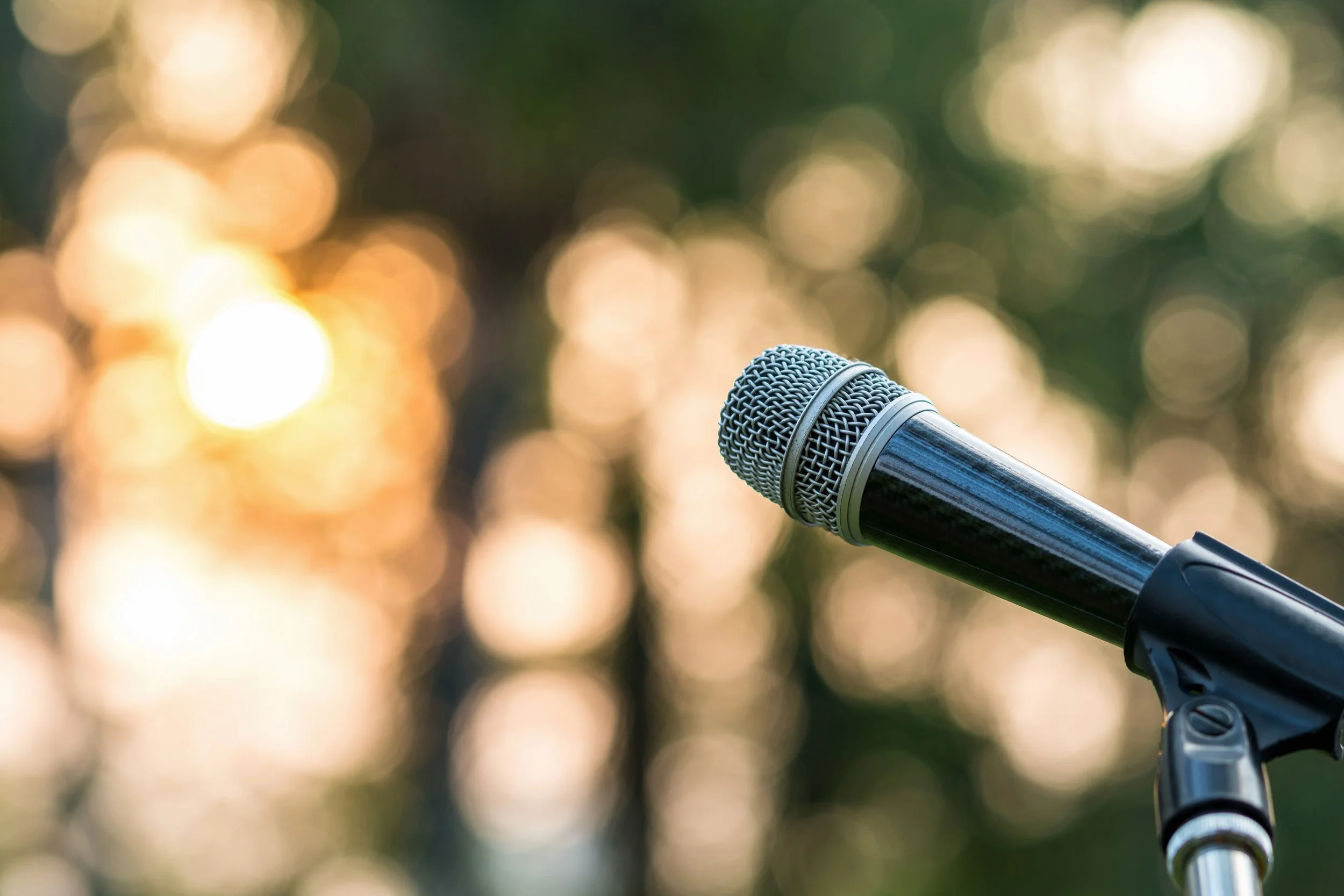 microphone-on-the-stage-over-the-abstract-blurred-2024-02-23-05-04-15-utc.jpg