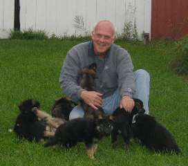 Tom_and_puppies_.jpg