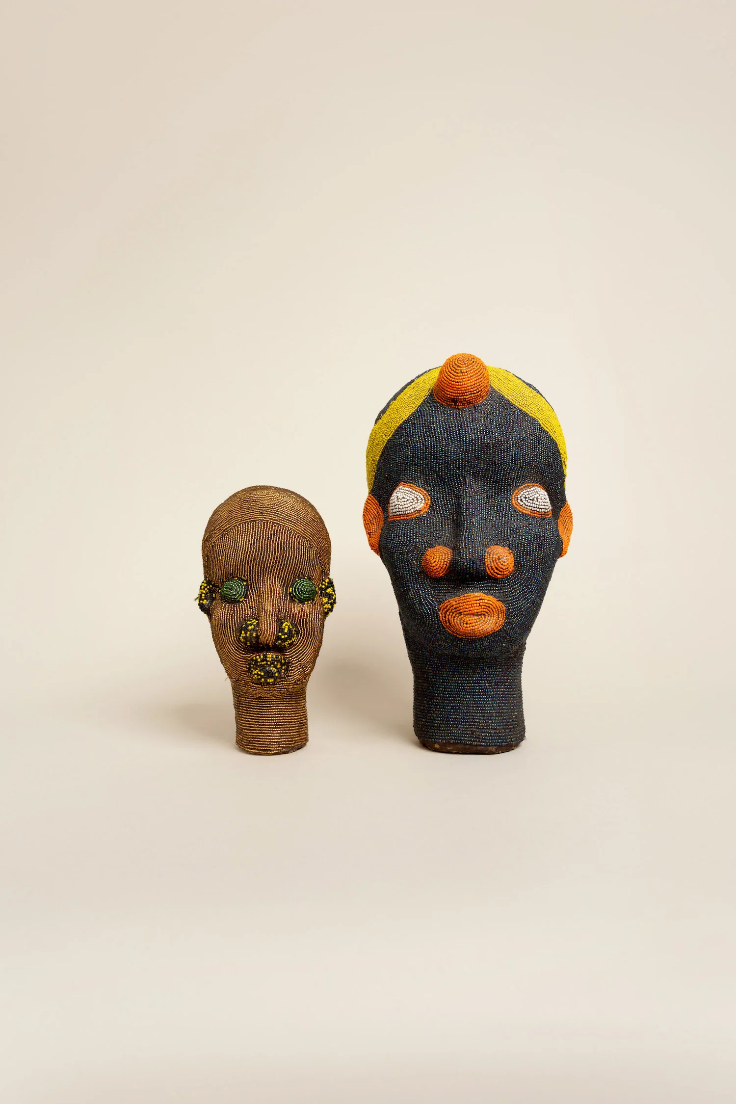 2 tetes africaines bleu et doree.jpg
