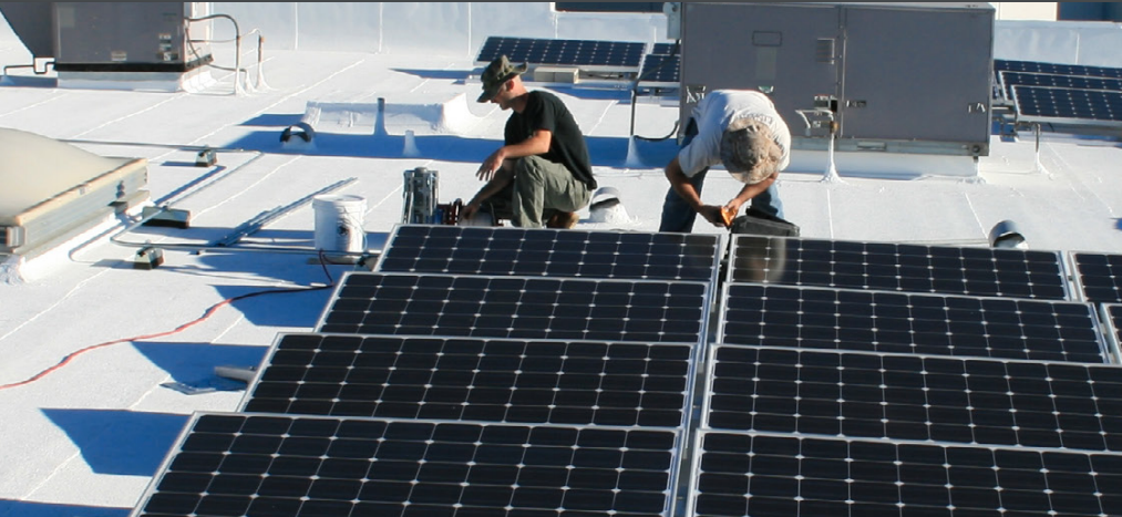 Combination solar and high-albedo roofs cut urban heat while generating clean energy.