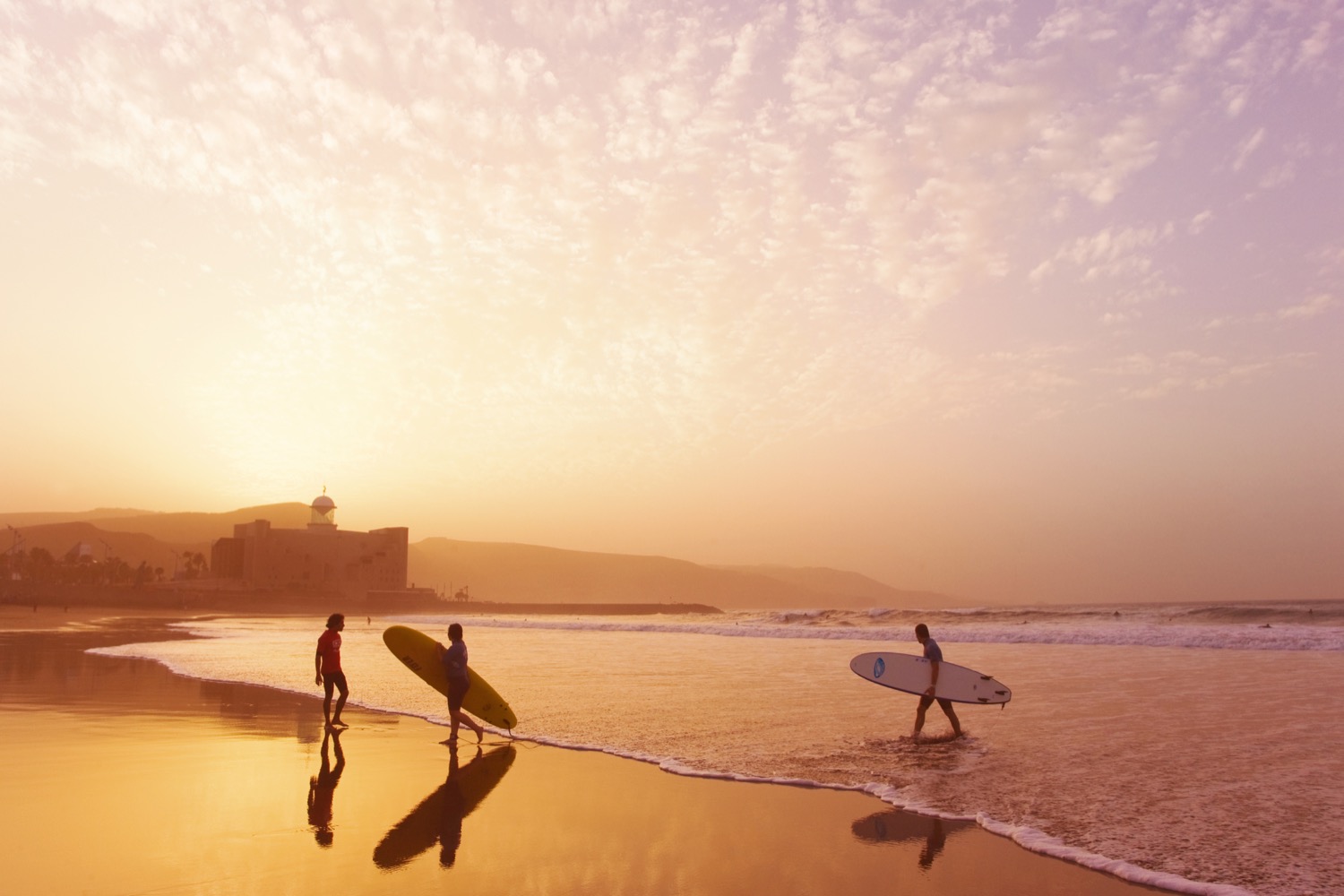 Surfer dudes on Las Canteras the cheshire magazine luxury lifestyle