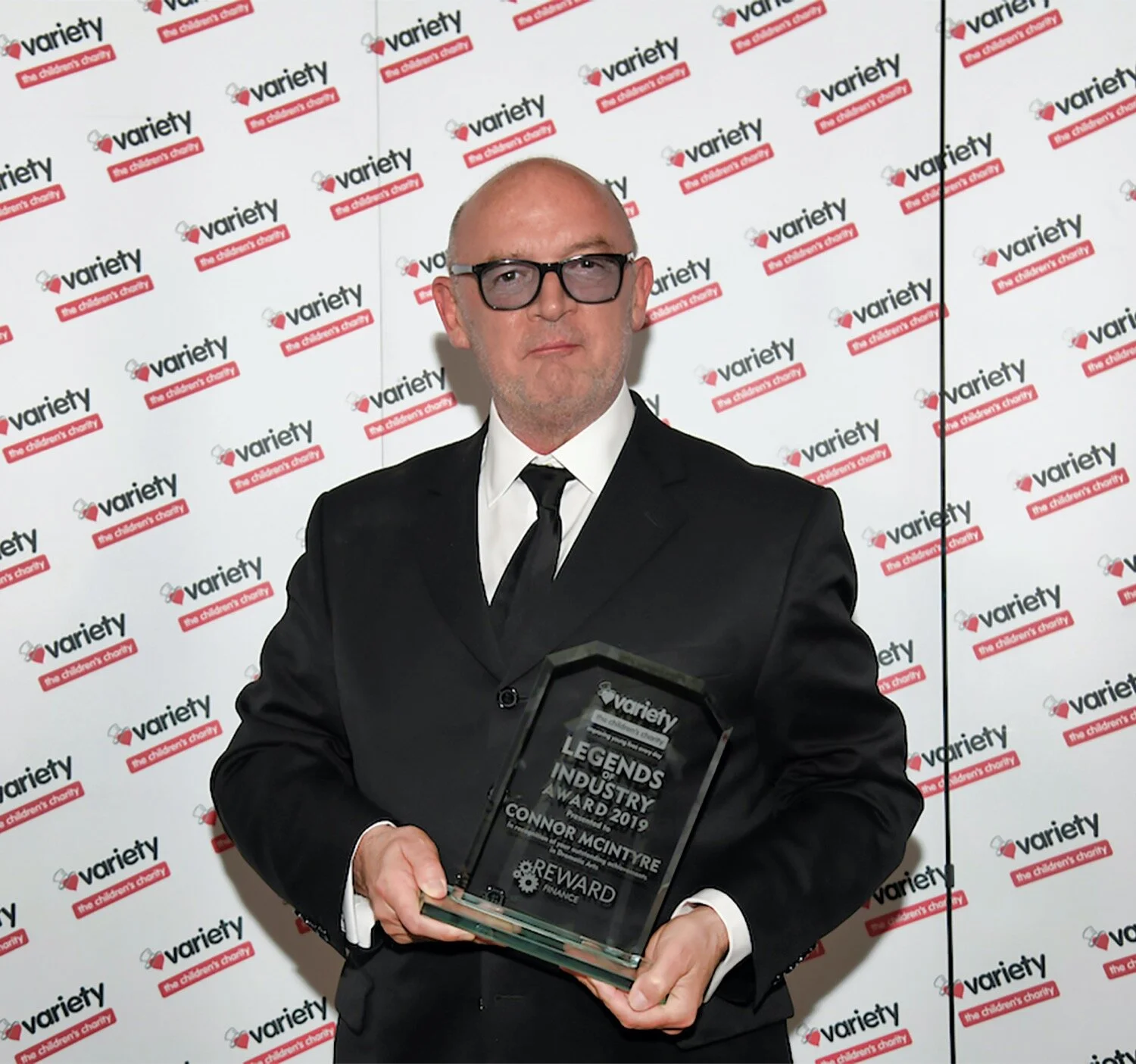 The Cheshire Magazine & Legends of Industry Connor-McIntyre-with-Award.jpeg