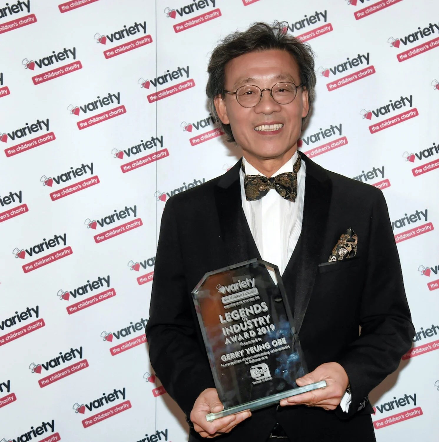 The Cheshire Magazine & Legends of Industry Gerry-Yeung-OBE-with-AWARD.jpeg