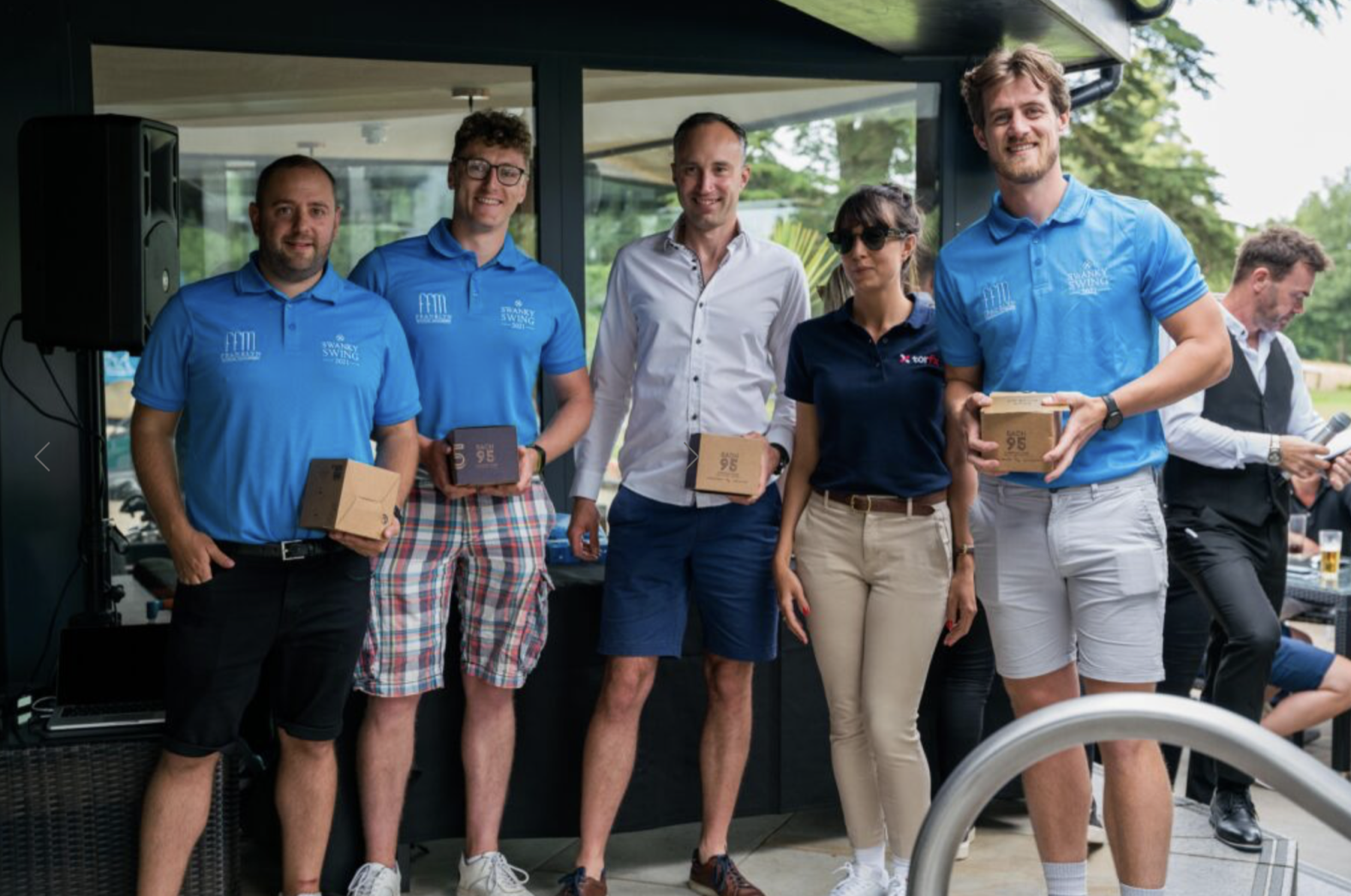  Winners of the Swanky Swing golf tournament, Langricks, presented with their prizes by Natalie Collins from TorFX 