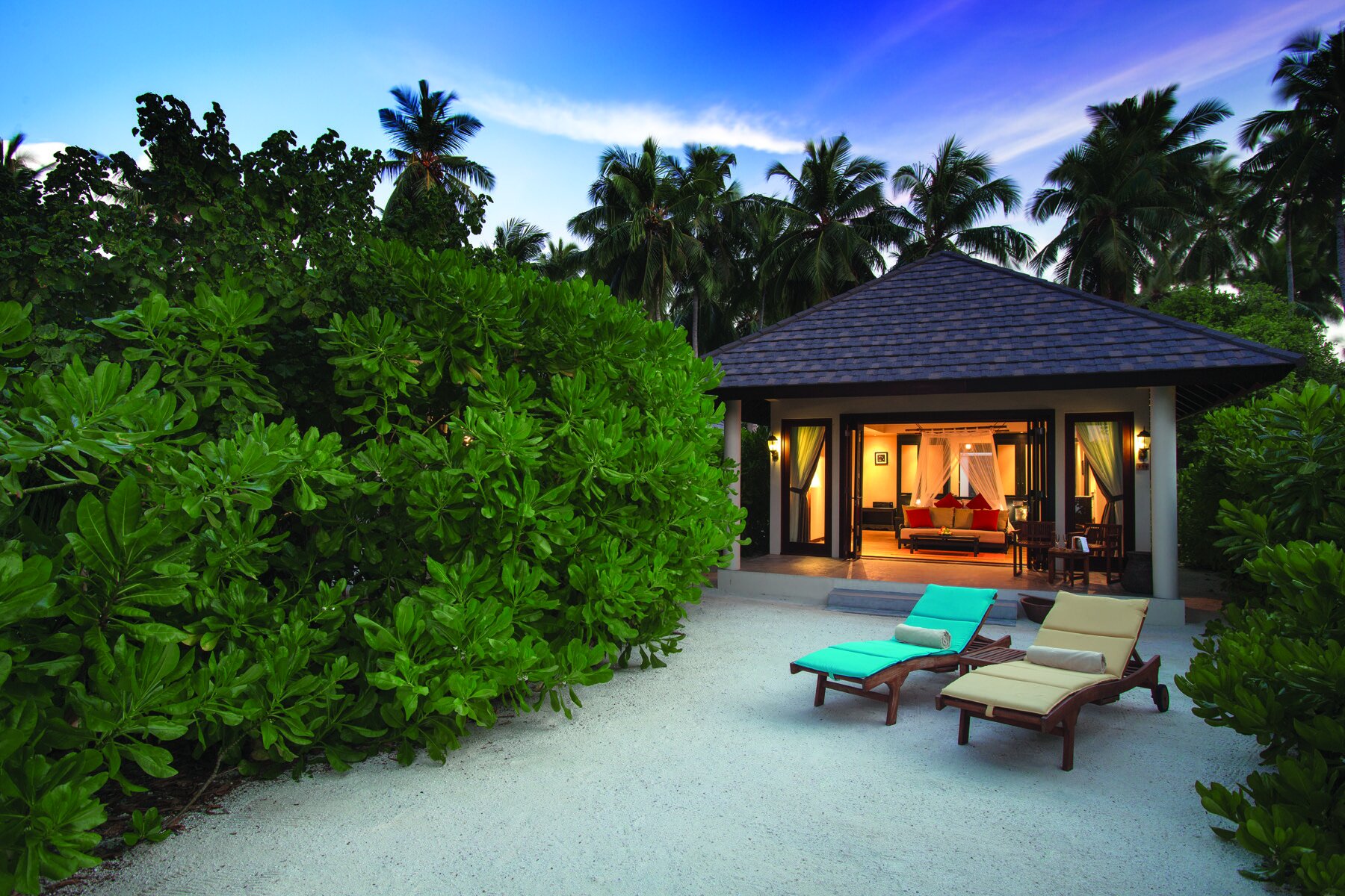 ATMOSPHERE KANIFUSHI MALDIVES - VLLAS - Sunset Beach Villa Exterior View to In - 09_2016.jpg