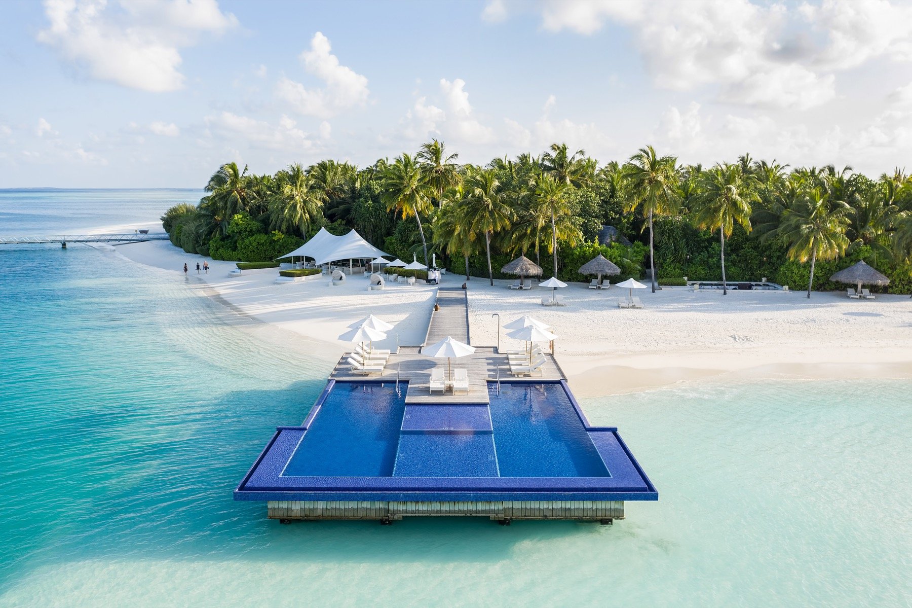 CONRAD MALDIVES_Aerial_The Quiet Zone Pool_Hero_credit Justin Nicholas - hi-res (2).jpg
