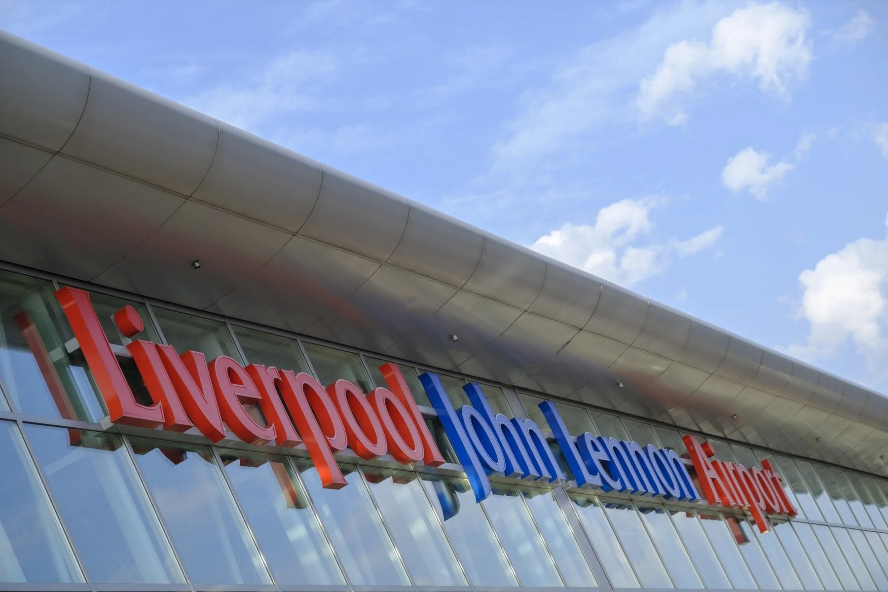 Close-up of Liverpool John Lennon Airport terminal sign.jpg