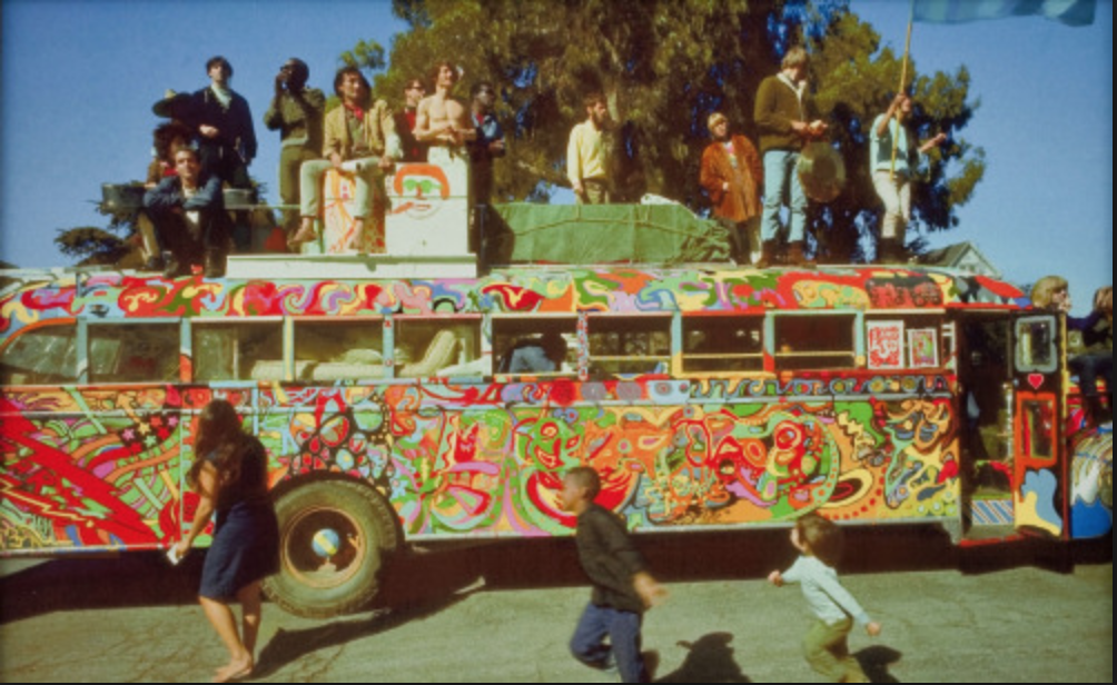 The original jesters, the Merry Pranksters cruisin’ down the highway in their acid-mobile.