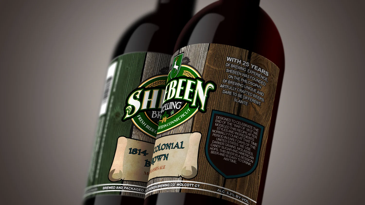 Two Shebeen bomber bottles side by side showing the crest, scroll and side panels of the 1814 Colonial Brown label