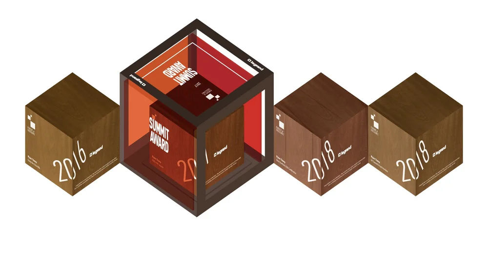 Illustration of four Legrand Pursuit of Excellence awards from 2016, 2017 and 2018, including a fully assembled Summit Award