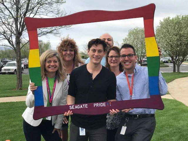 (Pictured: Amy Zuckerman, Shawna Callison, Morgan Allen Co-Chair of Seagate Pride's Longmont Chapter, Ross Thomas, Sheila Phillips, and Ian Waltman Chair of Seagate Pride's Longmont Chapter)