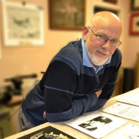 JIM CLARY AT DESK.png