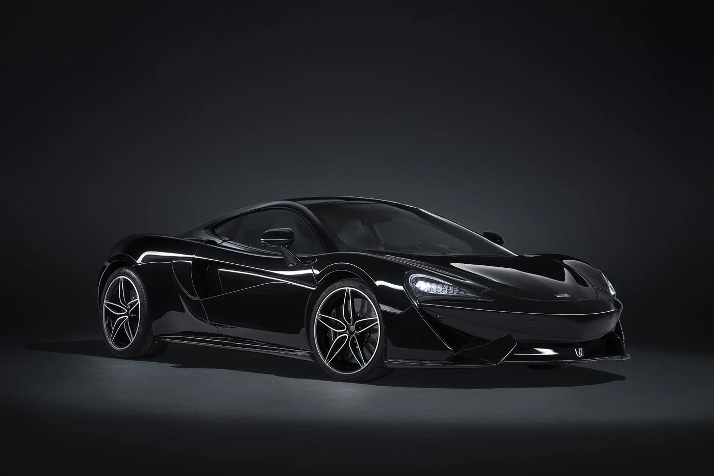 MSO Black 570GT Geneva_Front_3Q_V2.jpg