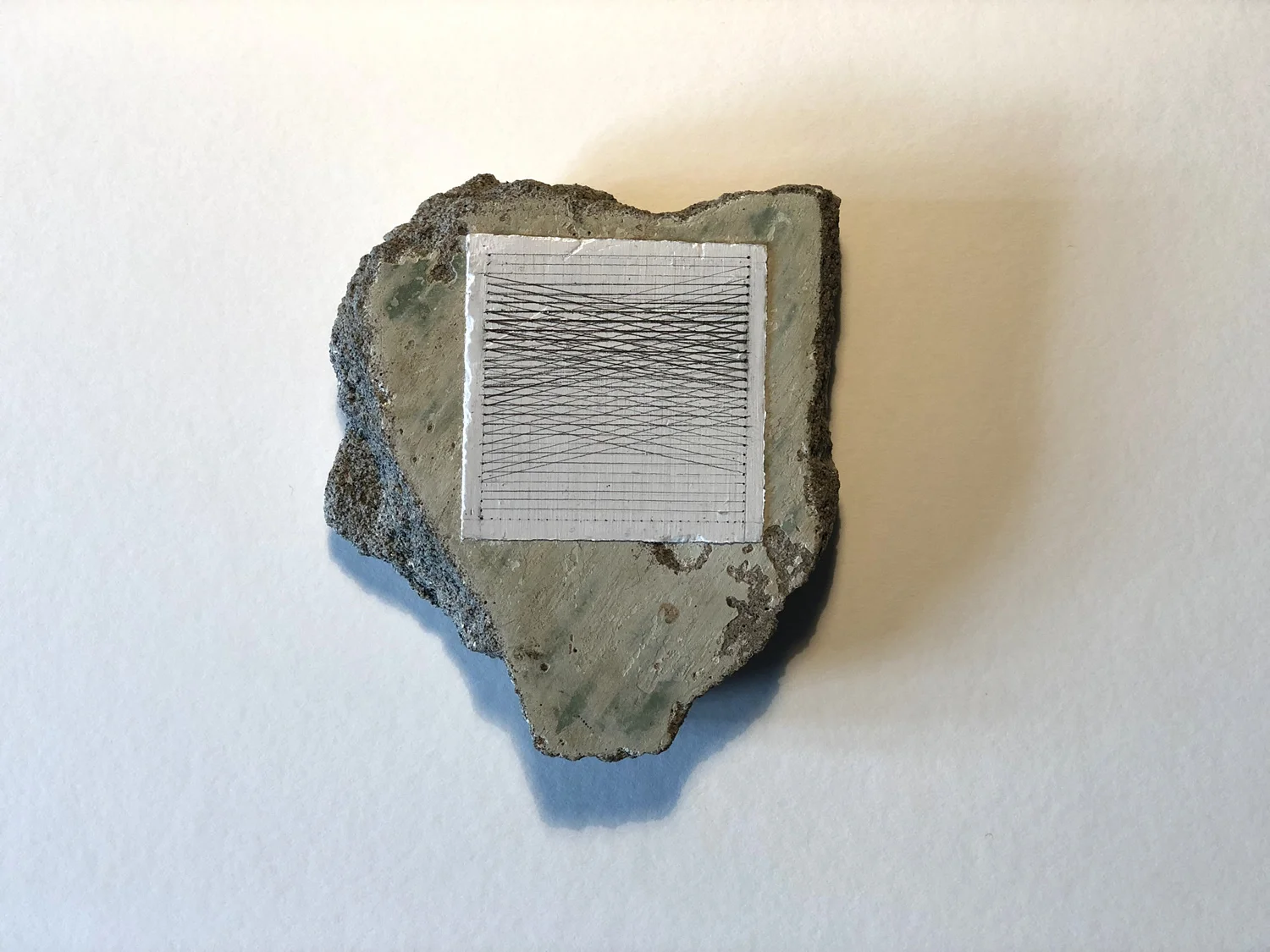 Tanya Goel | Modernist Fragment (Anand Niketan) | 2018 | Stucco and pencil drawing fragment collected from demolition site of modernist home in Anand Niketan | Dimension Variable