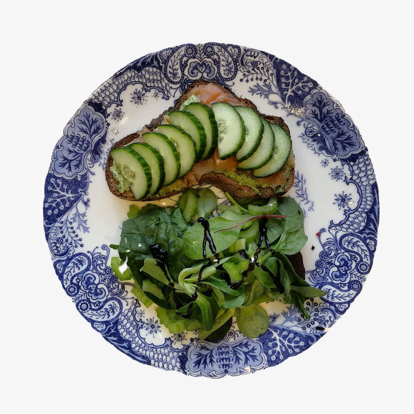 Smoked salmon on toast with cucumber, pesto mayo and salad