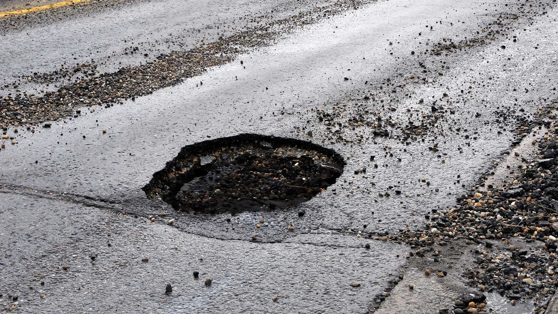 Nicollet-Avenue-Pothole-Discovered-to-Be-Direct-Route-to-Earths-Core.jpg