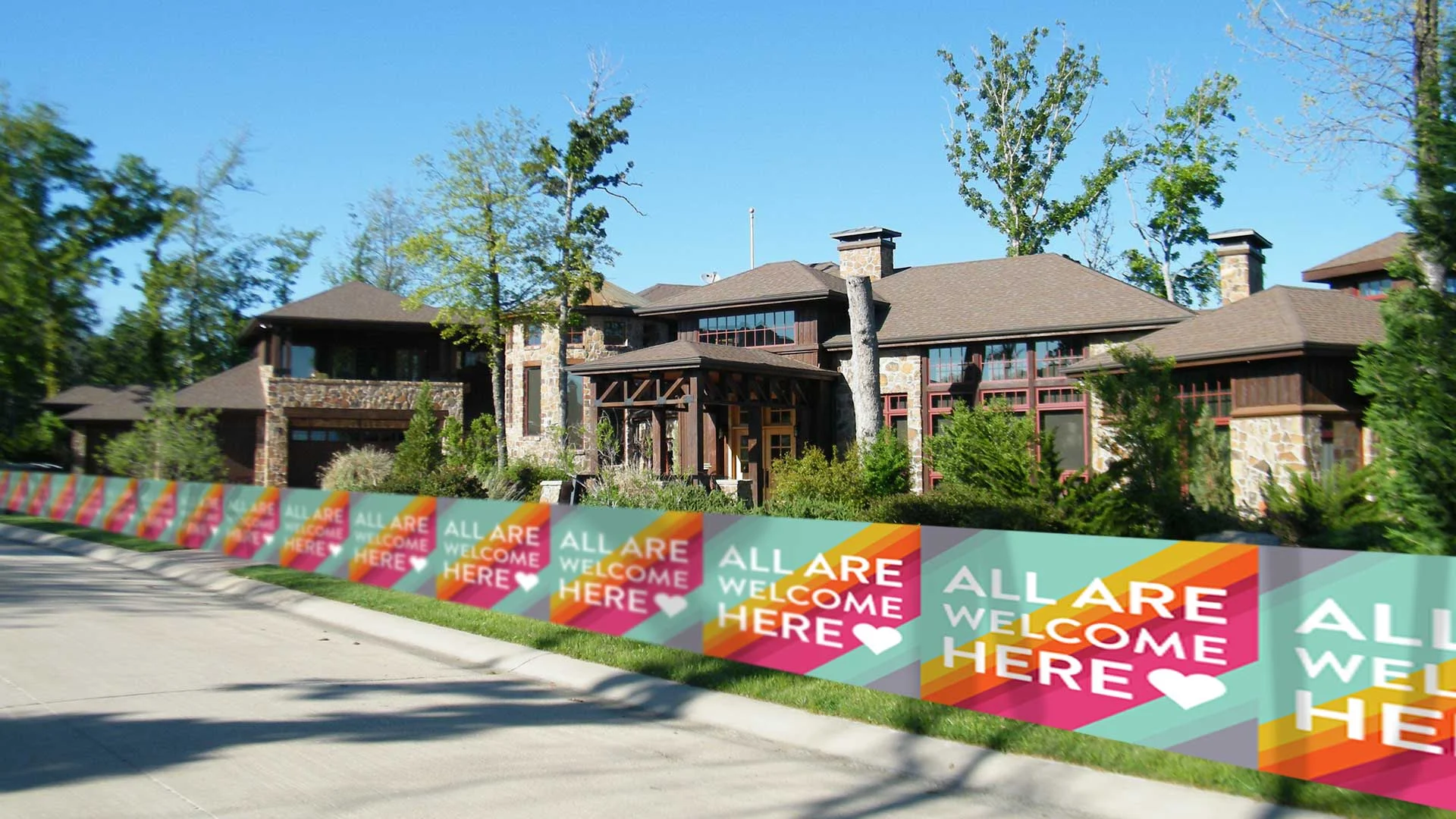 Longfellow-Residents-Invest-in-Single,-Mile-Long-All-Are-Welcome-Here-Lawn-Sign.jpg
