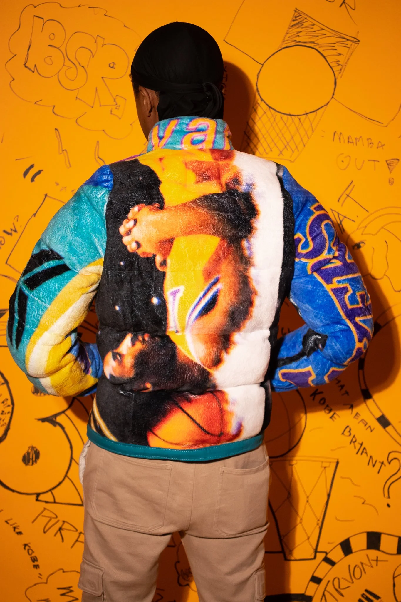  Initial prototype worn on-model to evaluate fit, scale, volume and overall silhouette development of the first jacket. (back view) 