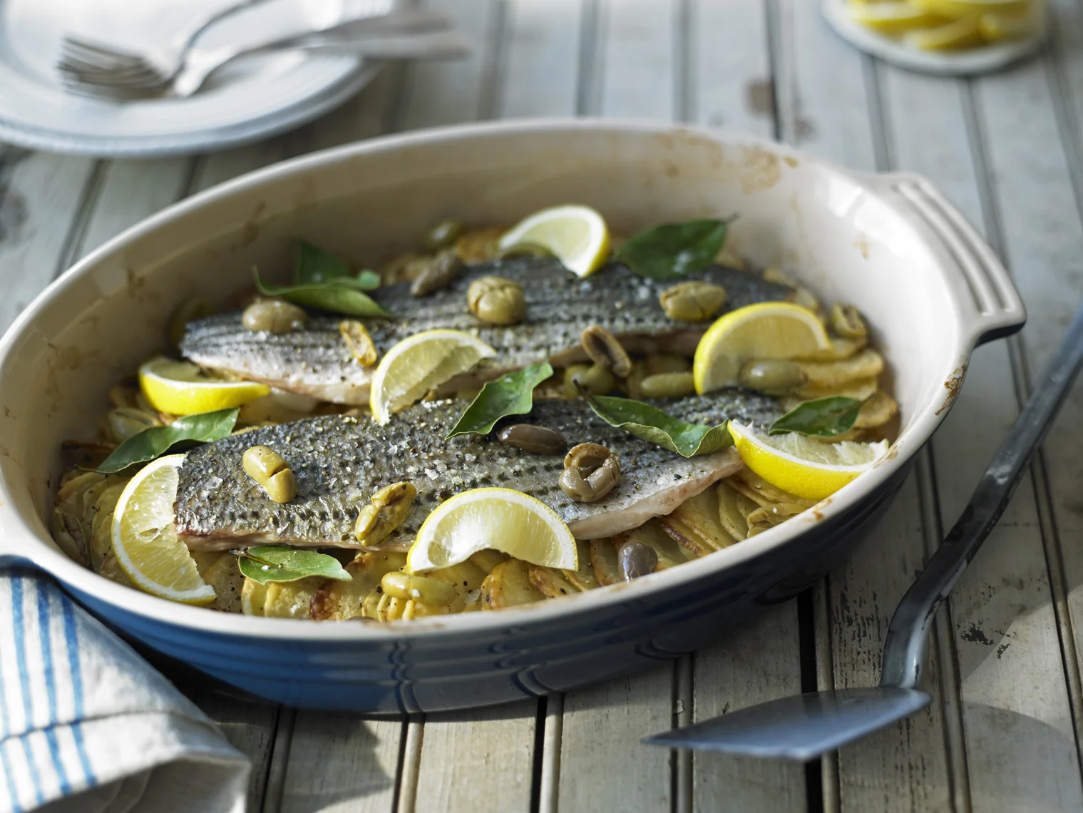 Florence Fabricant's Striped Bass With Potatoes and Olives; photo by Michael Kraus for The New York Times