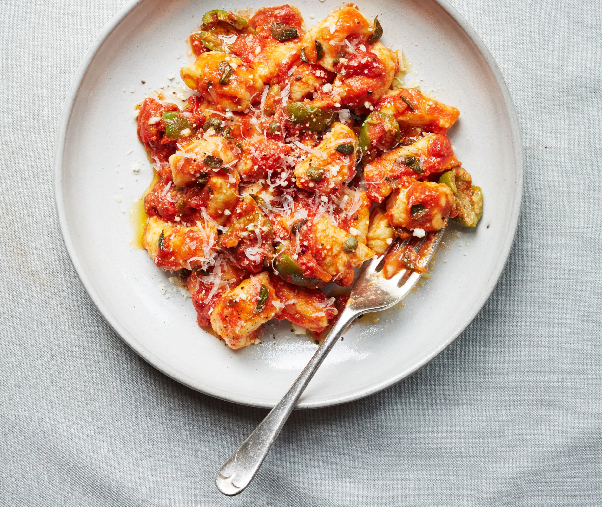 Ricotta and Egg Gnocchi with Olives, Capers, and Tomato Sauce; photo by Con Poulos for SAVEUR