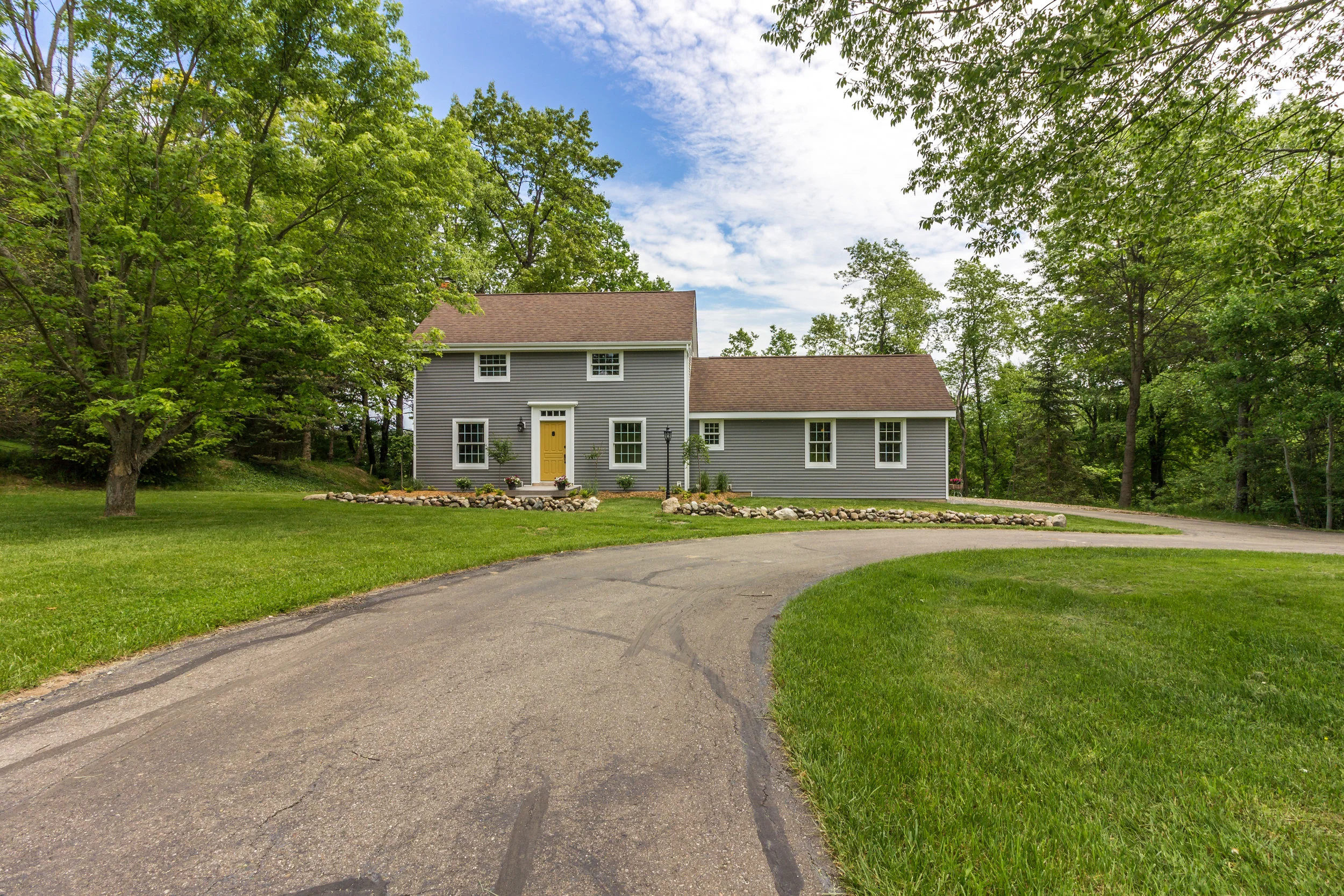 Yellow Door Lakefront Home in Holly, MI