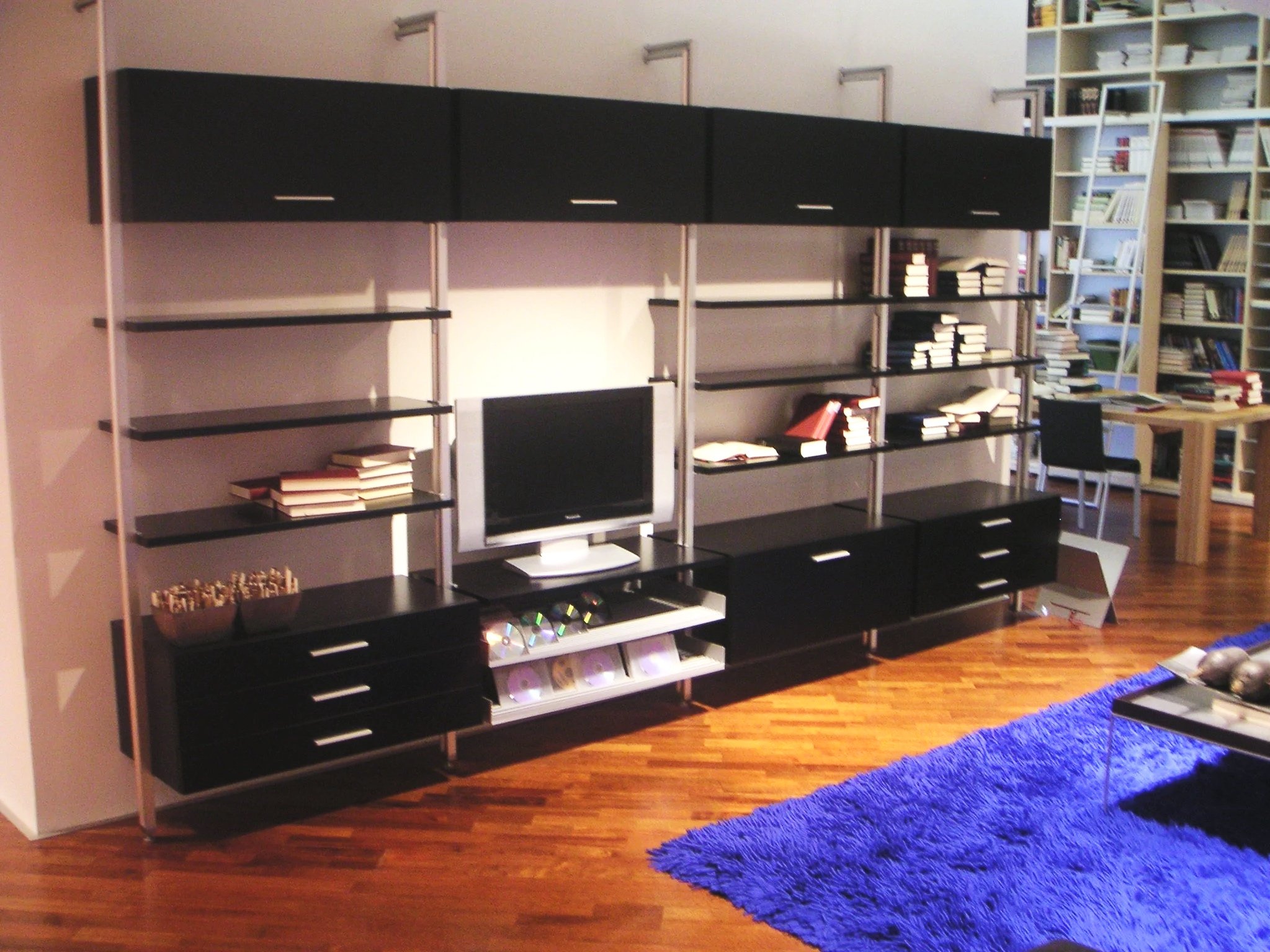 POL MEDIA WALL WITH STORAGE CABINETS
