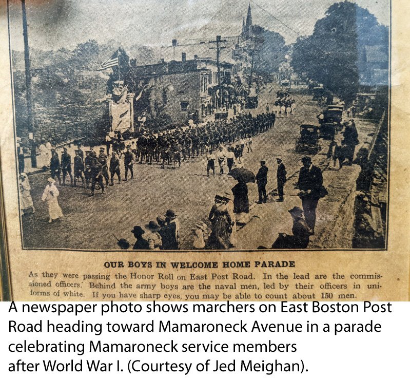  A newspaper photo shows marchers on East Boston Post Road in Mamaaroneck heading toward Mamaroneck Avenue in a parade celebrating Mamaroneck service members after World War I. (Courtesy of Jed Meighan). 