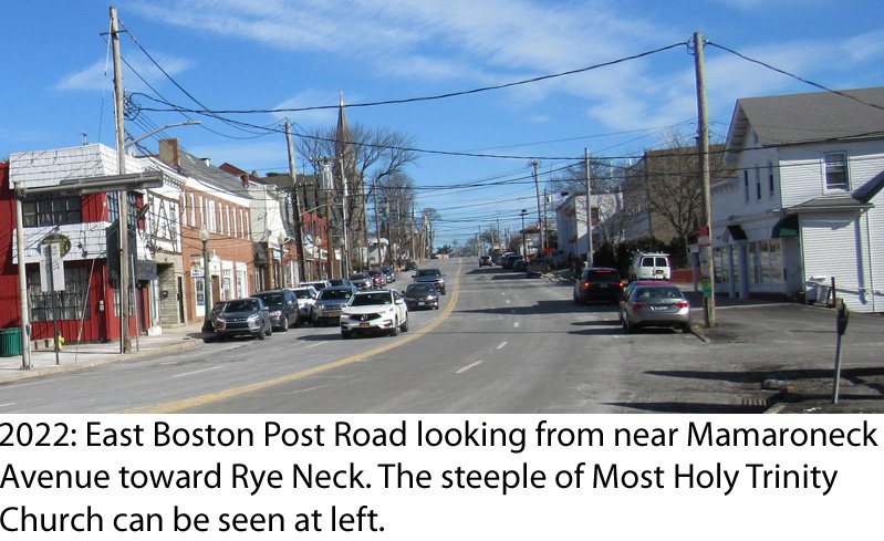  2022: East Boston Post Road looking from near Mamaroneck Avenue in Mamaroneck toward Rye Neck. The steeple of Most Holy Trinity Church can be seen at left.&nbsp;  