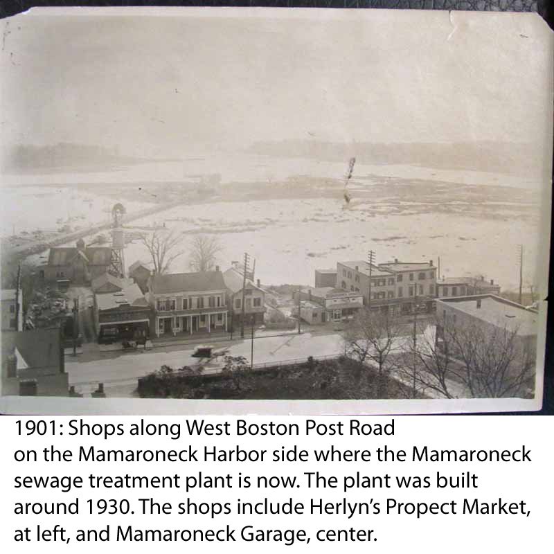  1901: Shops along West Boston Post Road in Mamaroneck on the Mamaroneck Harbor side where the Mamaroneck sewage treatment plant is now. The plant was built around 1930. The shops include Herlyn’s Propect Market, at left, and Mamaroneck Garage, cente