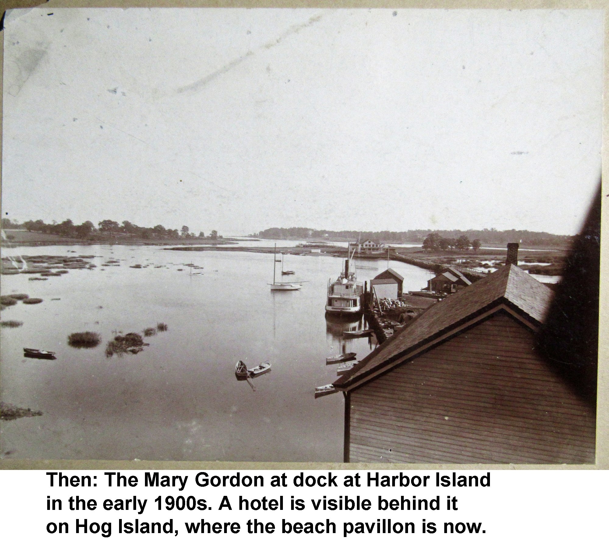 WD-13-B The Mary Gordon at Dock Harbor Island early 1900s Hotel visible behind it on Hog Island captioned.jpg