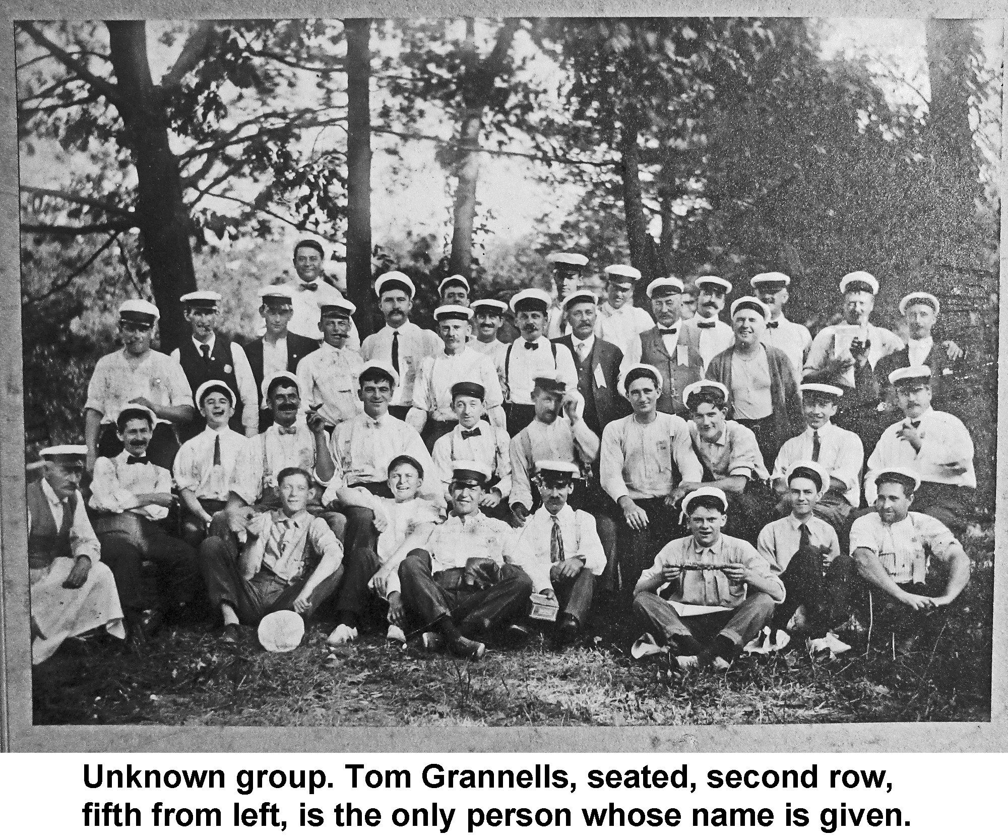 WD-34 Unknown group Tom Grannells captioned.jpg