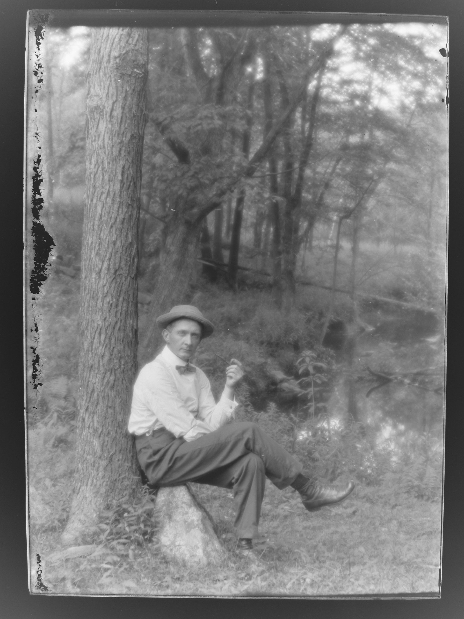 GN-091 Man sitting on rock in the woods.jpg