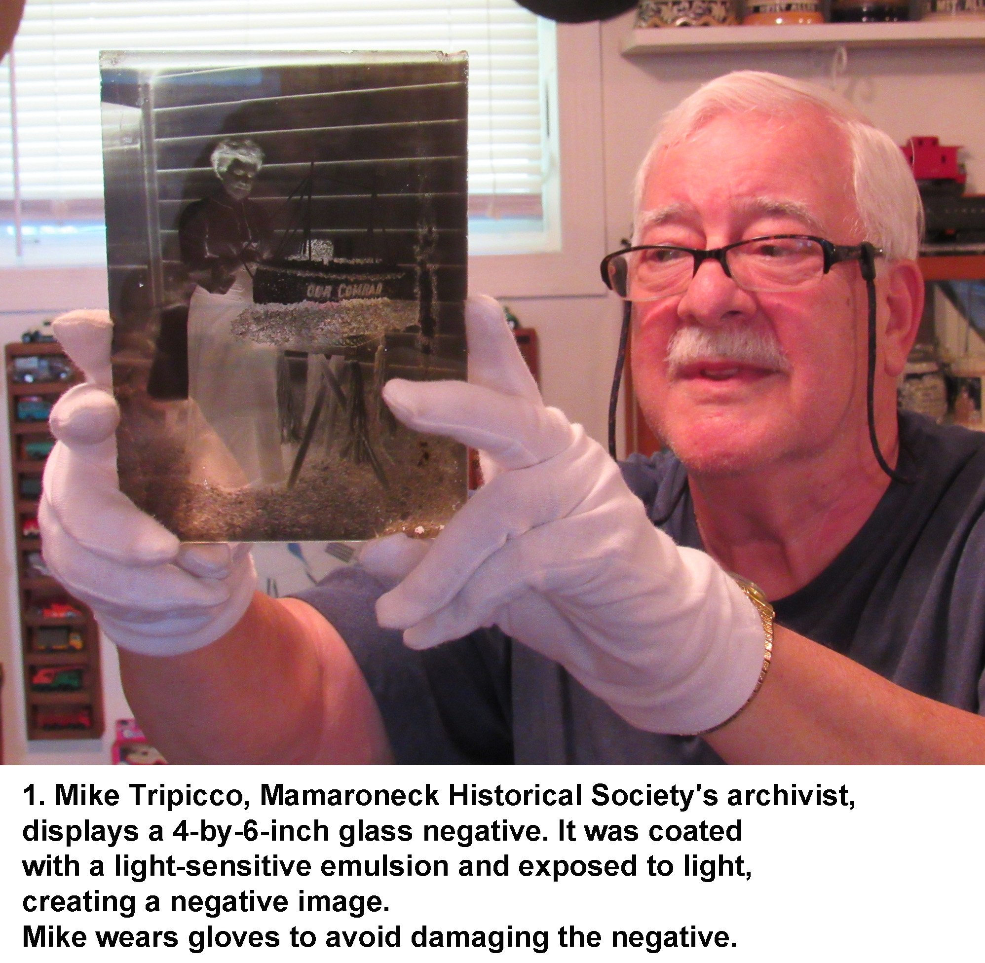 1 Mike Tripicco displays glass negative.jpg