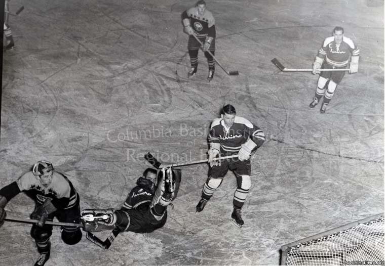 2285.0014: Opening Hockey Game between Rossland Warriors and Trail Smoke Eaters 1956.